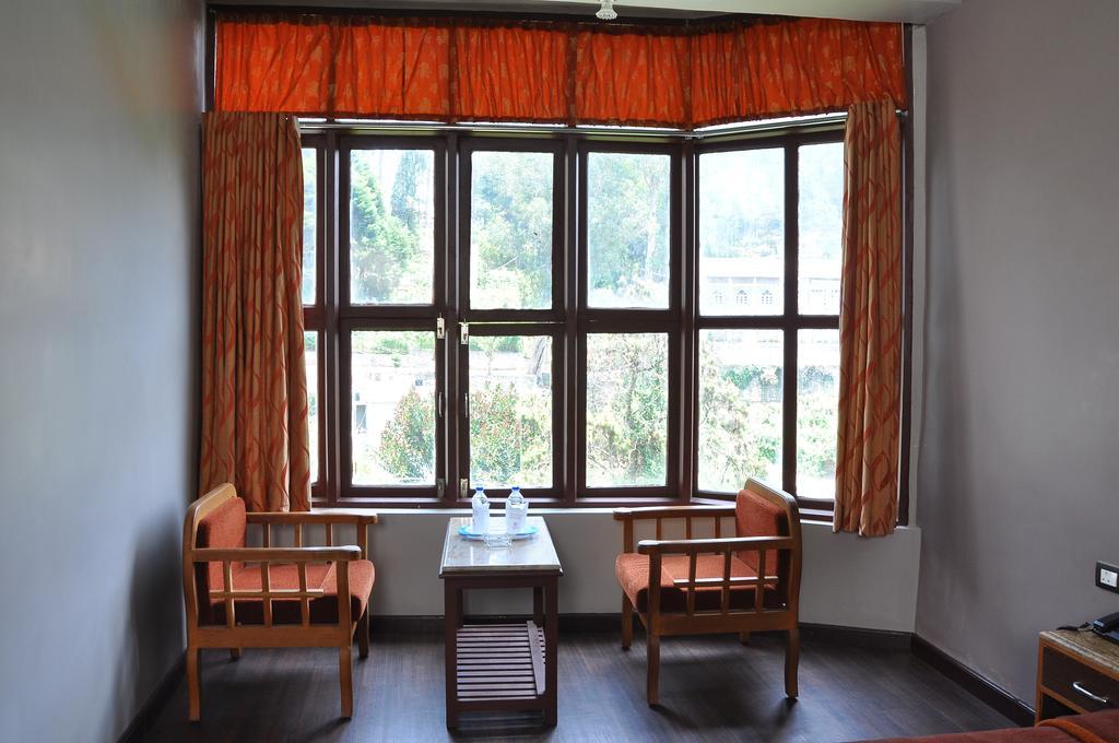 Grand Paradise Inn Kodaikanal Ruang foto